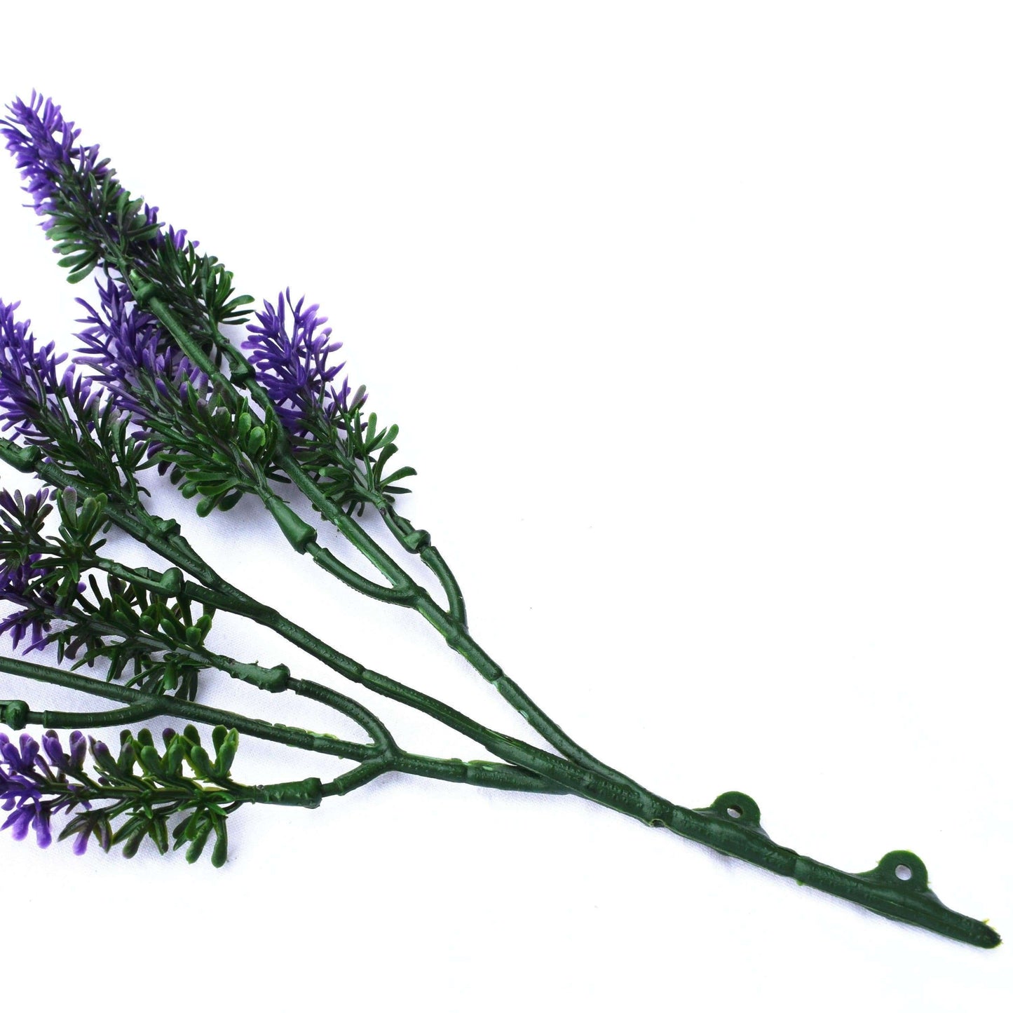 an artificial lavender sprig laid flat
