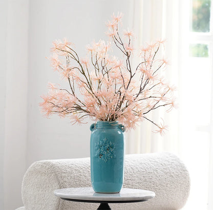 artificial pink dandelion grass on display