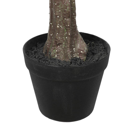 a close up on the pot of the artificial tree