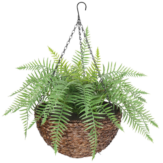 a hanging artificial fern in a basket